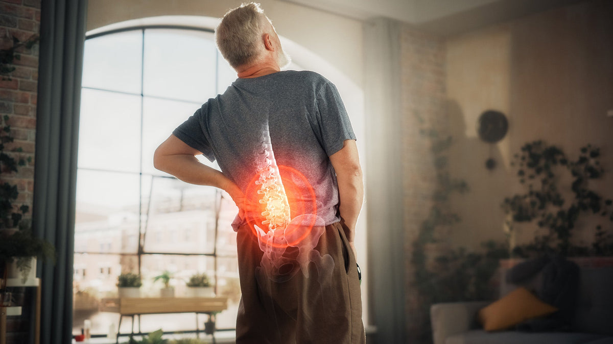 Man with back pain considering whether red light will help